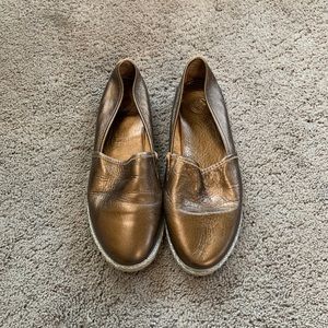 Gold bronze slip on sneakers